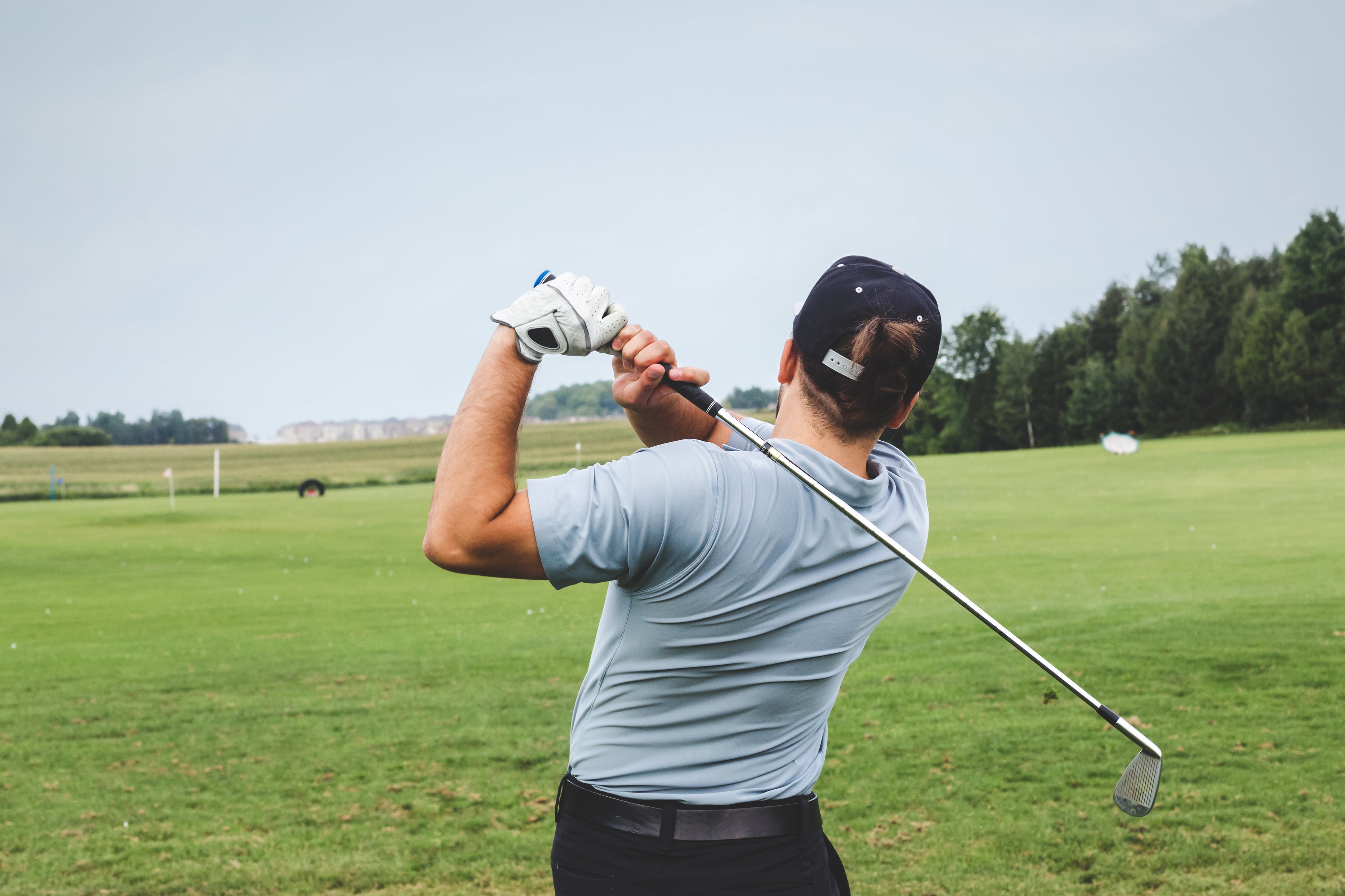 Golfer Swing Follow Through